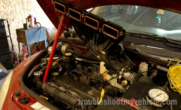 The Majority Of 2.4L Chrysler Fuel Injectors Are Underneath The Upper Intake Manifold Plenum The Majority Of 2.4L Chrysler Fuel Injectors Are Underneath The Upper Intake Manifold Plenum