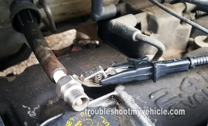 Checking All Four Spark Plug Wires For Spark. How To Test The Ignition Coil (1996, 1997, 1998, 1999, 2000, 2001, 2002, 2003, 2004, 2005, 2006, 2007 2.4L Caravan, Grand Caravan, Voyager, Grand Voyager) Checking All Four Spark Plug Wires For Spark. How To Test The Ignition Coil (1996, 1997, 1998, 1999, 2000, 2001, 2002, 2003, 2004, 2005, 2006, 2007 2.4L Caravan, Grand Caravan, Voyager, Grand Voyager)