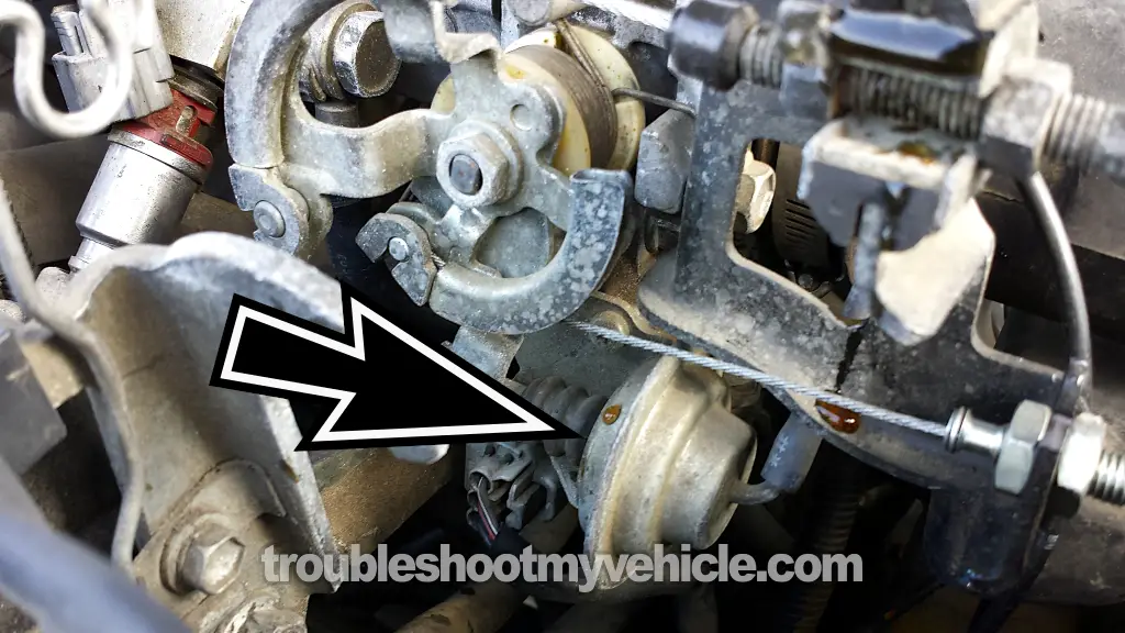 Location Of The Throttle Opener Vacuum Diaphragm. TPS Idle Switch Multimeter Test (1993, 1994, 1995, 1996, 1997 1.8L Toyota Corolla) Location Of The Throttle Opener Vacuum Diaphragm. TPS Idle Switch Multimeter Test (1993, 1994, 1995, 1996, 1997 1.8L Toyota Corolla)