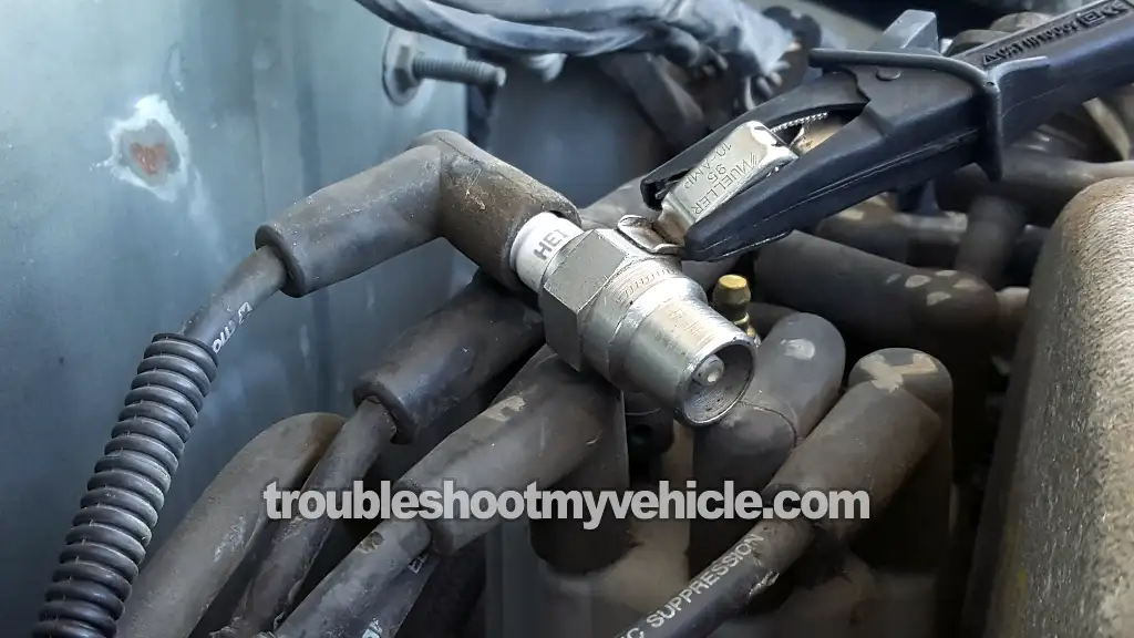 Testing The Ignition Coil's High Tension Wire For Spark. How To Test The Ignition Coil (1992, 1993, 1994, 1995, 1996, 1997, 1998, 1999, 2000, 2001, 2002, 2003 5.2L, 5.9L V8 Dodge Ram Pickup) Testing The Ignition Coil's High Tension Wire For Spark. How To Test The Ignition Coil (1992, 1993, 1994, 1995, 1996, 1997, 1998, 1999, 2000, 2001, 2002, 2003 5.2L, 5.9L V8 Dodge Ram Pickup)