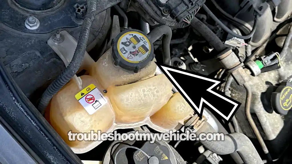 Coolant Shooting Out Of The Coolant Expansion Tank. How To Test For A Blown Head Gasket (2001, 2002, 2003, 2004, 2005, 2006, 2007, 2008, 2009, 2010, 2011, 2012 3.0L V6 Ford Escape, Mercury Mariner, And Mazda Tribute)