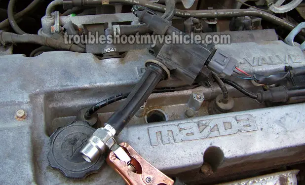 Testing The Ignition Coil For Spark -Cylinders #2 And #4. How To Test The Ignition Coils (1999-2001 1.6L Mazda Protegé) Testing The Ignition Coil For Spark -Cylinders #2 And #4. How To Test The Ignition Coils (1999-2001 1.6L Mazda Protegé)