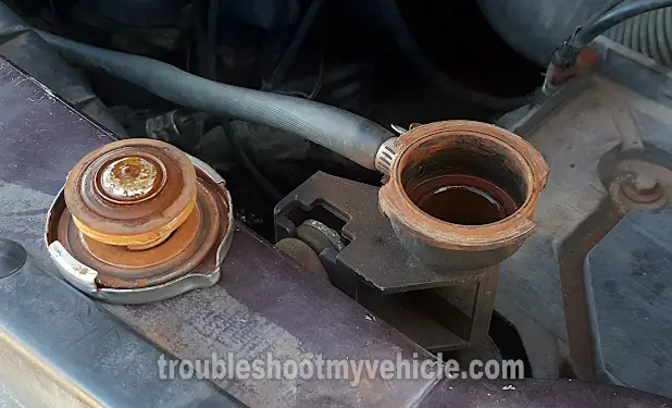 Exhaust Gases Shooting Out Of The Radiator. How To Test For A Blown Head Gasket (1991, 1992, 1993, 1994, 1995 2.5L Dodge Caravan And Plymouth Voyager) Exhaust Gases Shooting Out Of The Radiator. How To Test For A Blown Head Gasket (1991, 1992, 1993, 1994, 1995 2.5L Dodge Caravan And Plymouth Voyager)